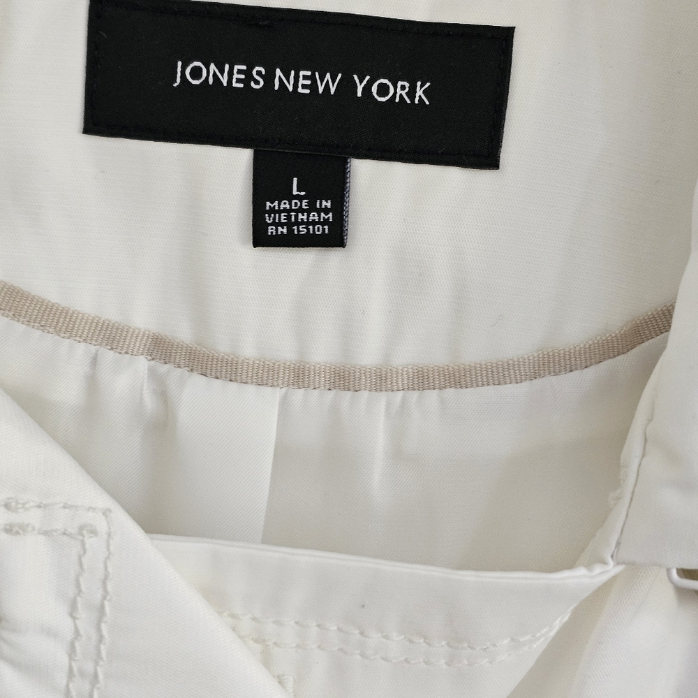 Jones New York Cream jacket with Blue and tan trim.